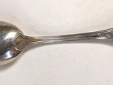 a spoon that is sitting on a table