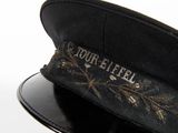 a black hat with a floral design on it