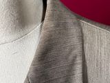 a close up of a suit on a mannequin dummy