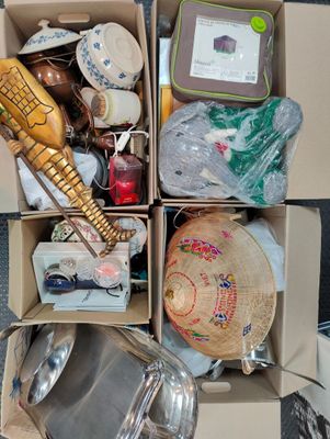 a box full of assorted items sitting on the floor