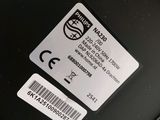 a close up of a cell phone with a sticker on the back of it