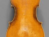 an old violin with a wooden back and a long neck
