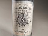 a bottle of wine that is sitting on a table