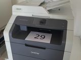 a printer that is sitting on top of a desk