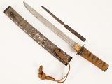 a knife and a knife holder on a white surface