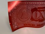 a red one dollar bill on a white surface