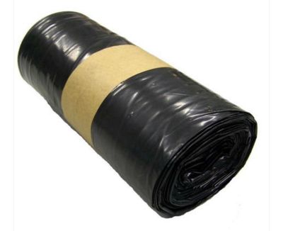 un gros plan sur un rouleau de plastique noir orné d'une bande marron