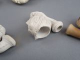 a group of clay objects that are on a table