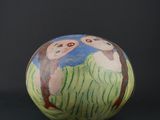 an image of a decorative vase with owls painted on it