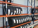 many tires on the shelves in the warehouse