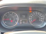 a close up of a speedometer and gauges in a car