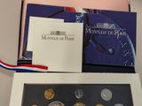 an image of a box of coins sitting on top of a table