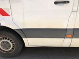 a white van with a red stripe on the side of it