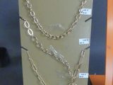 a display case with chains on it in a store