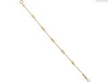 a gold chain bracelet with a diamond cut design