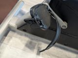 a close up of a bike handle on a luggage bag