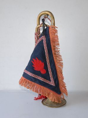 an image of a blue and orange towel with a red bird on it