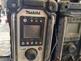 two radio ' s sitting on a table in a room