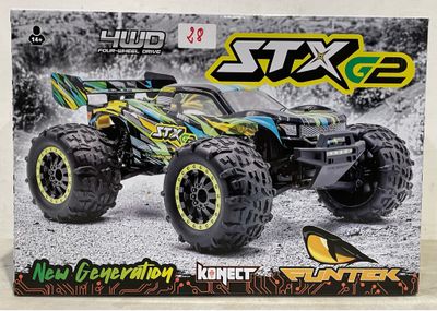 une image représentant un monster truck miniature dans une boîte