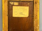 an old picture of a wooden frame with a label on it