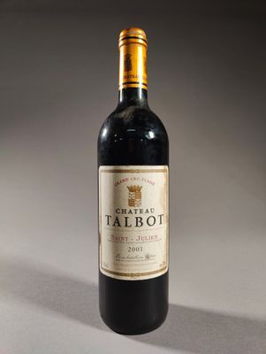 a bottle of wine that is sitting on a table