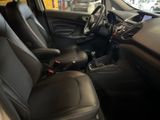 the interior of a car with black leather seats and a steering wheel