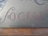 a sign that says social on the side of a building
