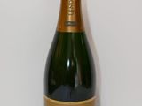 an image of a bottle of champagne on a table