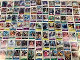 a large collection of pokemon cards on a table