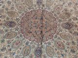 an image of a large oriental rug on a wooden floor