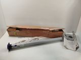 a picture of a box and a tube on a table