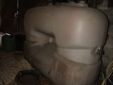 a large tank sitting in the middle of a room