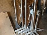 a pile of chairs that are sitting in a room