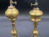 pair of antique brass candlesticks with handles and finings