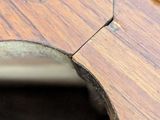 a wooden table with a hole in the middle of it