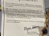 a picture of a bracelet that has a certificate on it