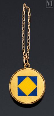 a close up of a necklace with a yellow and blue diamond on it