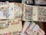 many different types of stamps on a table