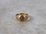 an image of a gold ring with a rose cut diamond