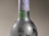 a bottle of wine that is sitting on a table