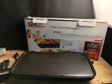 a box with a pan on it sitting on a table