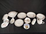 a lot of plates and cups on the table