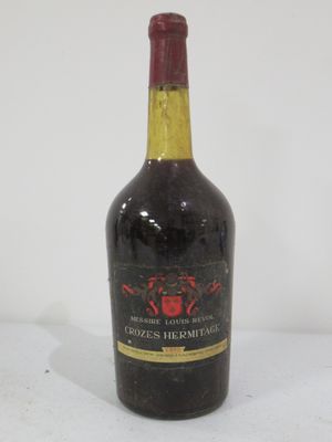a bottle of wine that is sitting on a table