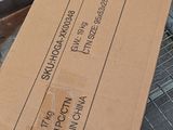 a cardboard box sitting on top of a carton