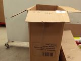 a carton with a box on top of it in the middle of a room