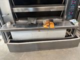 an oven that has some food inside of it