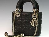 chanel black quilted leather handbag with gold chain handles