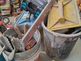 a lot of tools on a shelf in a room