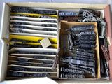 a box full of different type of typewriters in it