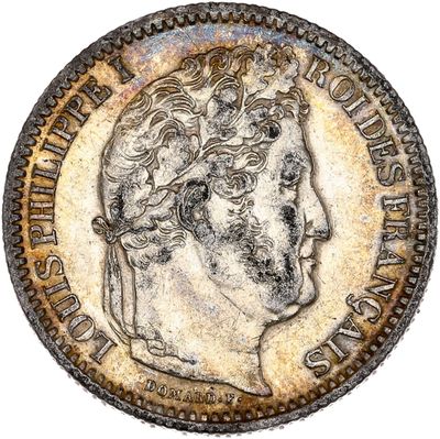 pièce de monnaie en argent portant l'image d'une tête d'homme